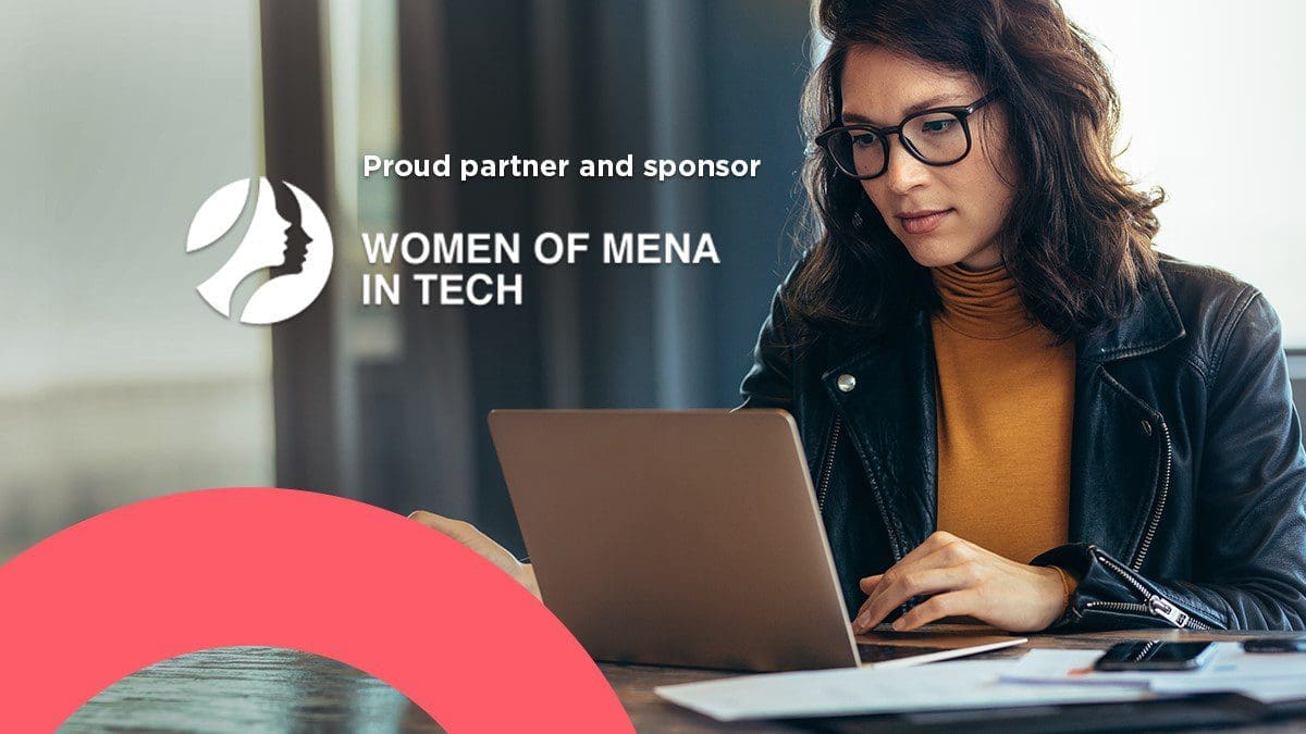 Woman using laptop to register for the Women of MENA in Technology Arizona launch event on December 1, 2022, hosted by arrivia
