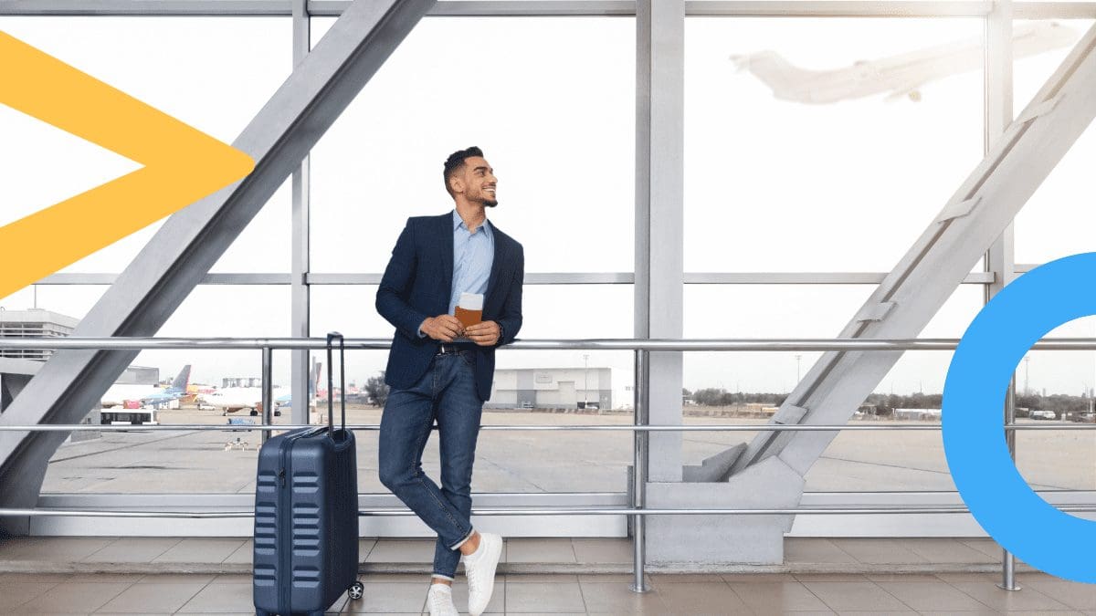 Man standing at an airport ready to take a flight booked innovative loyalty programs